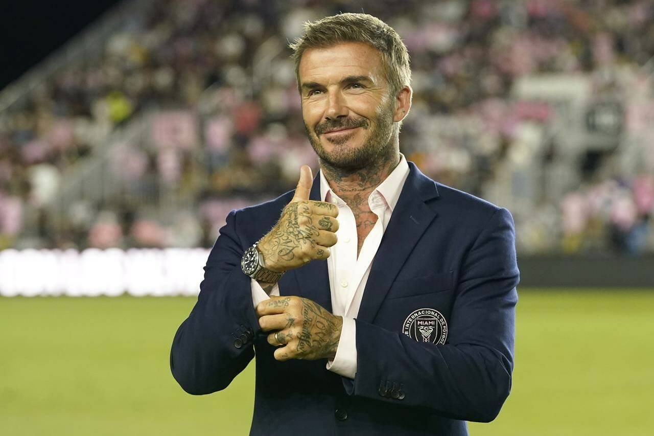 FILE - Inter Miami co-owner David Beckham gives the thumbs up before a Leagues Cup soccer match Adam Grinwis, Wednesday, Aug. 2, 2023, in Fort Lauderdale, Fla. A four-part Netflix series, “Beckham” explores Beckham’s upbringing and his triumphs on the field. (AP Photo/Lynne Sladky, File)