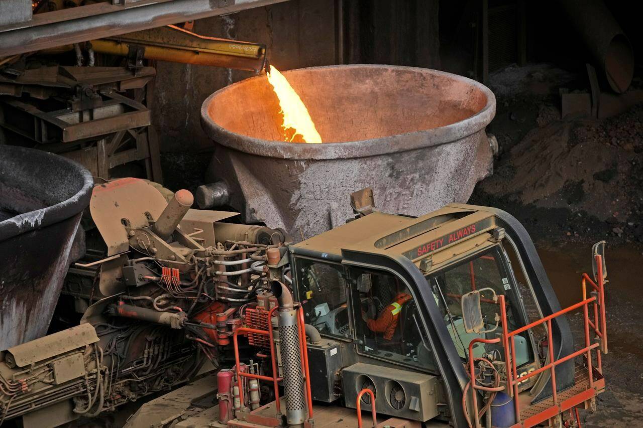 A worker operates a truck as molten slag is poured into a container at PT Vale Indonesia’s nickel processing plant in Sorowako, South Sulawesi, Indonesia, Tuesday, Sept. 12, 2023. Demand for critical minerals like nickel and cobalt is surging as climate change hastens a transition to renewable energy, boosting carbon emissions by miners and processors of such materials. (AP Photo/Dita Alangkara)