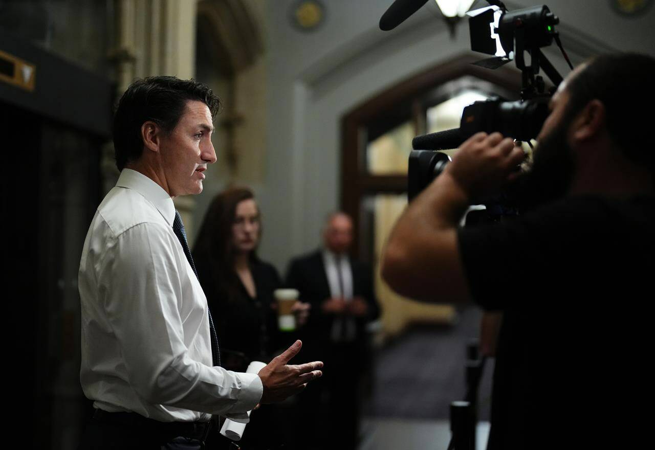 Prime Minister Justin Trudeau speaks to reporters as he arrives for a cabinet meeting in Ottawa, Tuesday, Oct. 3, 2023.THE CANADIAN PRESS/Sean Kilpatrick