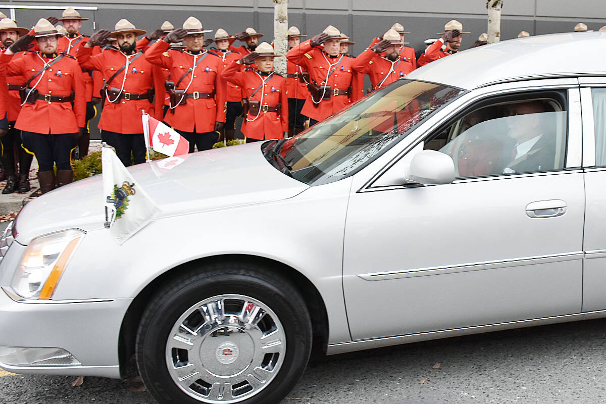 Members of the RCMP lined up outside the Langley Events Centre on Wednesday, Oct. 4, for a final salute to Const. Rick O’Brien following his funeral ceremony. (Colleen Flanagan/The News)