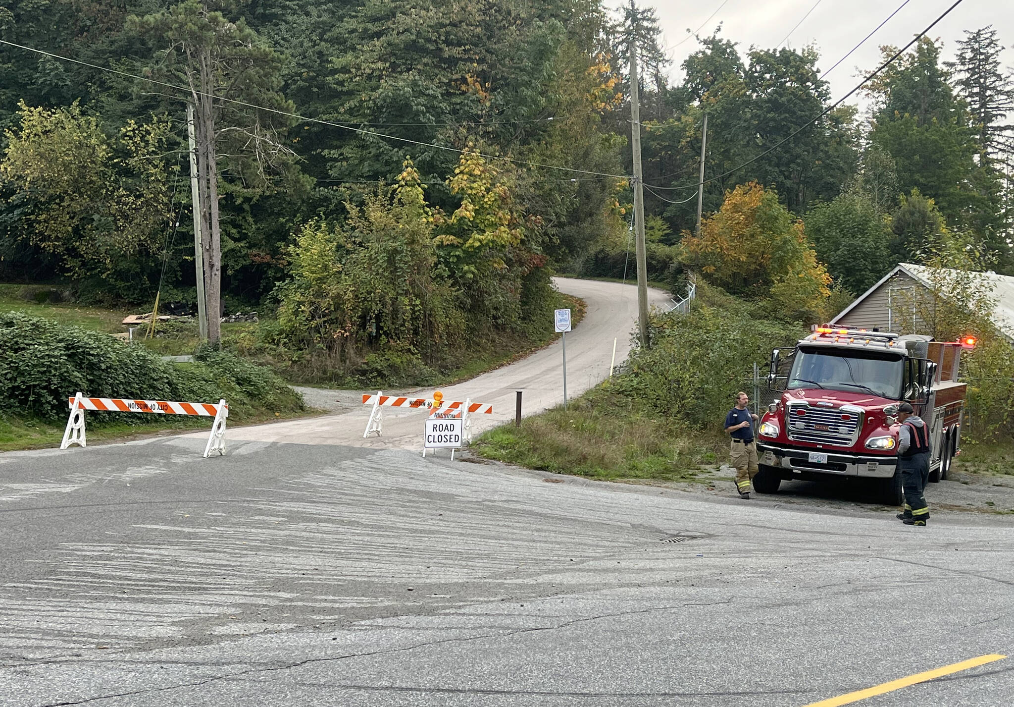 Gunn Avenue, in the Silverdale area, is still closed to public traffic due to a pair of fires and on ongoing police incident. Residents have been allowed to return to their homes.	/ Kevin Mills Photo