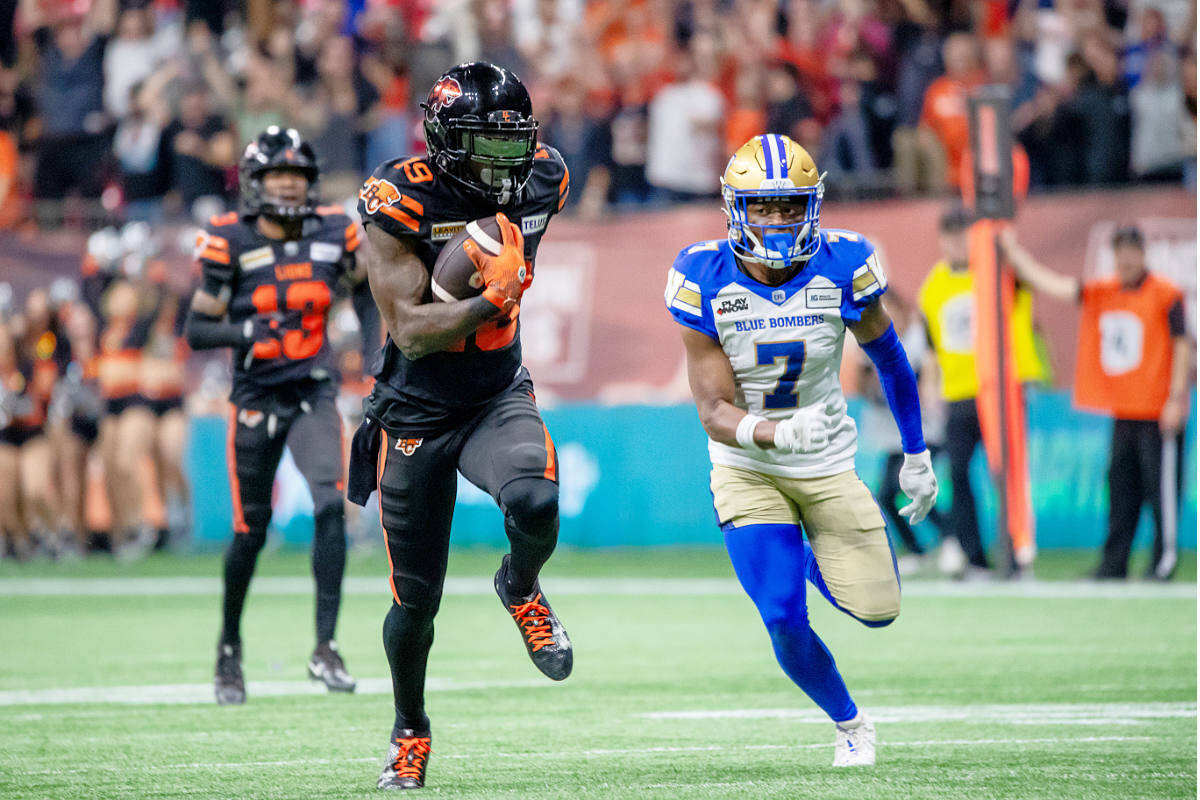 Dominique Rhymes (19) of the Lions tries to score on the last play of the fourth quarter but Winnipeg's Jamal Parker (7) would make a touchdown saving tackle to force overtime. The Bombers beat the Lions 34-26 to secure first place in the Western Division. (Steven Chang, B.C. Lions photo)