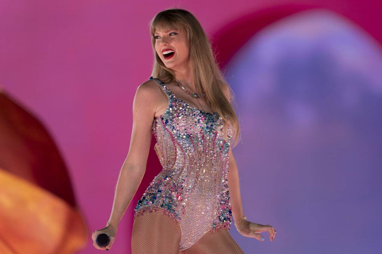 FILE - Taylor Swift performs during “The Eras Tour” in Nashville, Tenn., on May 5, 2023. Swift is releasing her “Taylor Swift: The Eras Tour” concert film on Oct. 13. (AP Photo/George Walker IV, File)