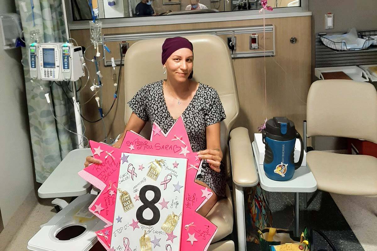 Sara Johnston was 39 years old when she was diagnosed with breast cancer in April 2021. Here, she celebrates the completion of her eighth and final round of chemotherapy. (Photo courtesy of Sara Johnston)