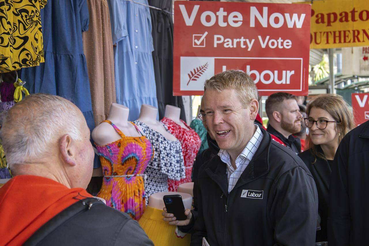New Zealand’s Prime Minister Chris Hipkins meets people on the street in Auckland on Friday, Oct. 13, 2023, the last day of campaigning for New Zealand’s election. New Zealanders vote in a national general election Saturday. (New Zealand Herald via AP)