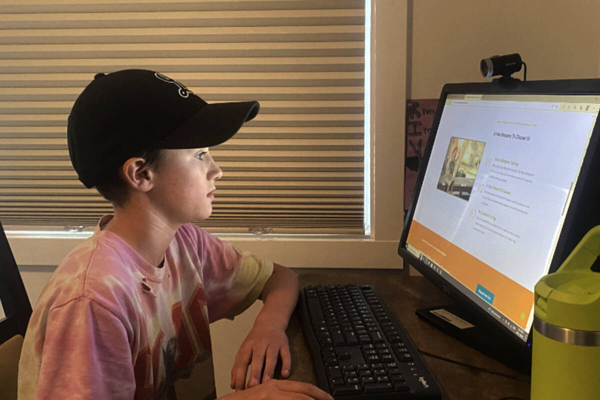 Grade 4 student Finely Comartin is dyslexic and since doing online tutoring he has moved up eight reading levels. (Ella Matte/News Staff)