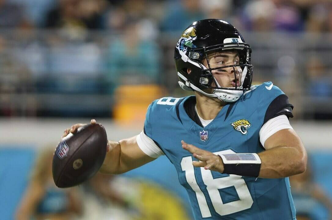 Jacksonville Jaguars quarterback Nathan Rourke (18) in action during an NFL pre-season football game against the Miami Dolphins, Saturday, Aug. 26, 2023, in Jacksonville, Fla. Canadian Rourke has been elevated to the Jaguars active roster. THE CANADIAN PRESS/AP-Gary McCullough