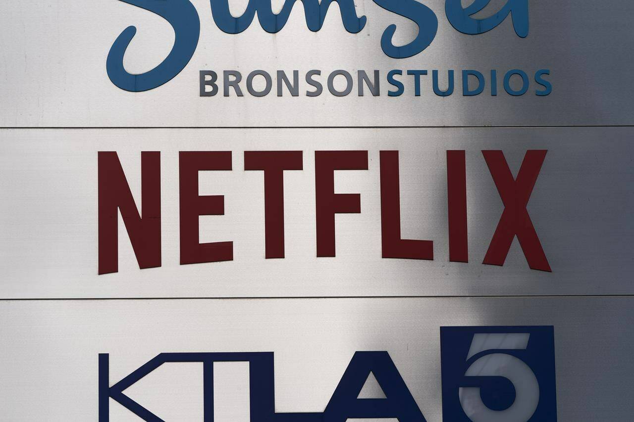 FILE - A Netflix sign is photographed outside its office building in Los Angeles, Wednesday, April 20, 2022. Netflix reports earnings on Wednesday, Oct. 18, 2023. (AP Photo/Jae C. Hong, File)