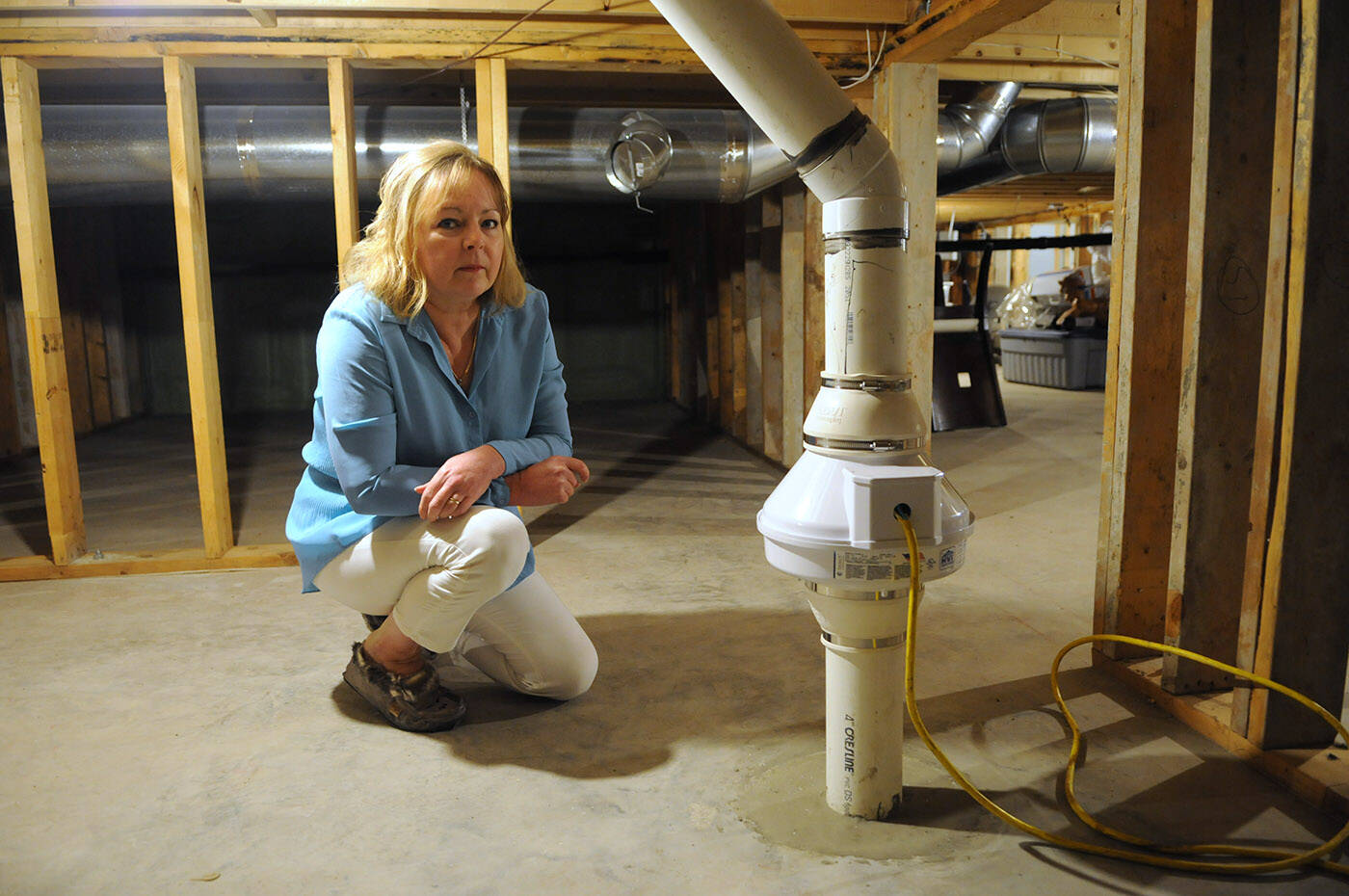 Jill Hall has this radon mitigation system installed in the crawl space of her Chilliwack home. Hall is a non-smoker who was diagnosed with lung cancer and is now warning people of the risks of radon. (Jenna Hauck/ Chilliwack Progress)