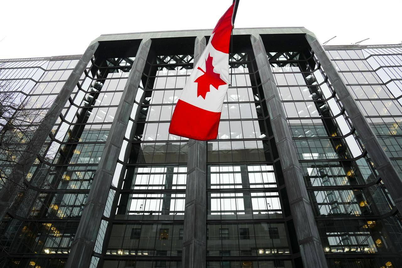 The Bank of Canada is widely expected to hold its key interest rate steady on Wednesday as the Canadian economy bends to higher interest rates and inflation resumes its downward trend. The Bank of Canada building is pictured in Ottawa on Tuesday, Dec. 6, 2022. THE CANADIAN PRESS/Sean Kilpatrick