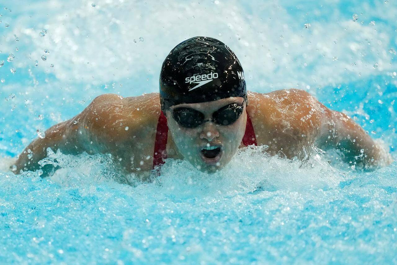 Canada’s Maggie Mac Neil, of London, Ont. competes in the 100m butterfly final at the Pan American Games in Santiago, Chile on Sunday Oct. 22, 2023. MacNeil won the gold medal. THE CANADIAN PRESS/Frank Gunn