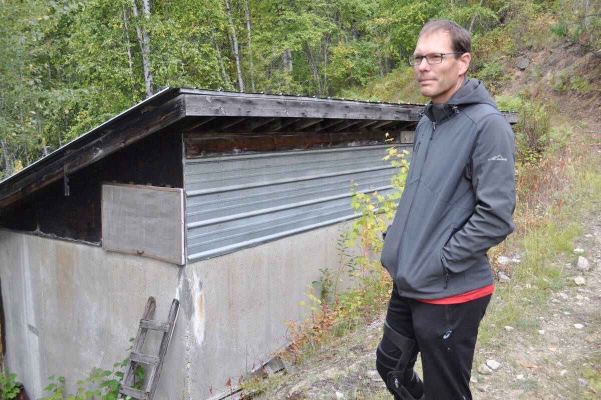 Ico de Zwart stands near the water box that serves the community of Krestova, B.C., located between Nelson and Castlegar. De Zwart is among volunteers trying to get the system upgraded to remove a boil water notice in place since 1992. Photo: Tyler Harper