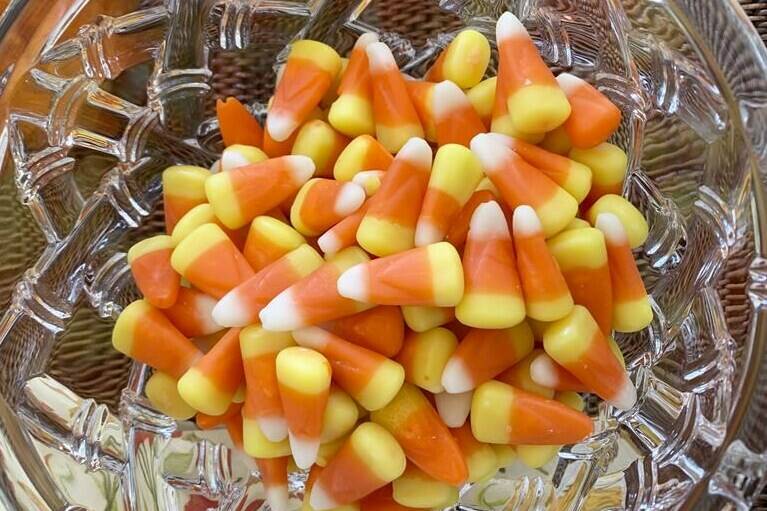 This image shows a bowl of candy corn in Westchester County, N.Y. on Oct. 23, 2023. Cruel joke for trick-or-treaters or coveted seasonal delight? The great Halloween debate over candy corn is on. (AP Photo/Julia Rubin)