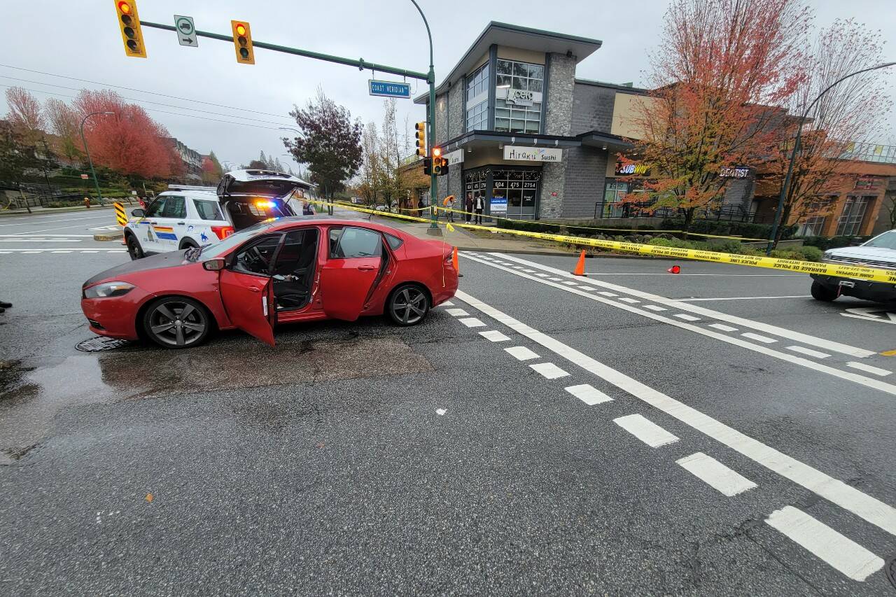 The driver of a red Dodge Dart was arrested by Coquitlam RCMP after driving through a fatal crash scene. (Photo courtesy of Coquitlam RCMP)