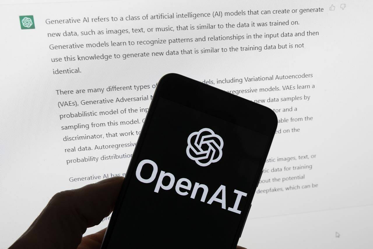 The OpenAI logo is seen on a mobile phone in front of a computer screen displaying output from ChatGPT, March 21, 2023, in Boston. Mission Public School District (MPSD) superintendent Angus Wilson says there are concerns with how AI is impacting learning, but the district is trying to see it as a complementary tool. (AP Photo/Michael Dwyer, File)