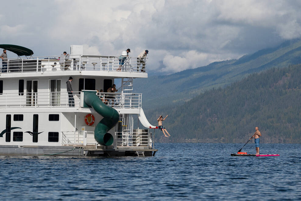 With temperatures typically in the 20s in late spring and early summer, beach time and water sports are favourite activities around Shuswap Lake. Twin Anchors Houseboats photo
