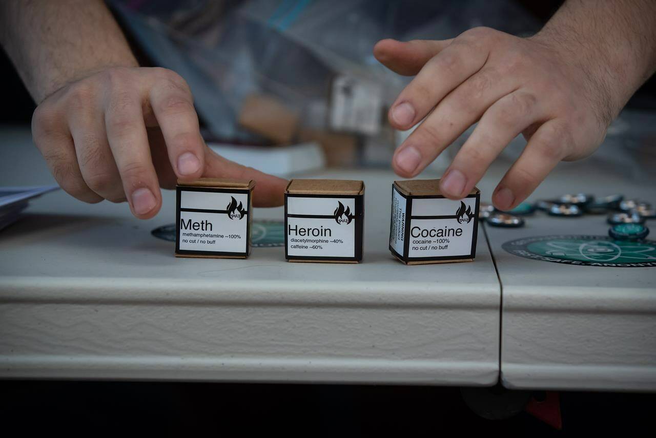 Methamphetamine, heroin and cocaine being handed out by the Drug User Liberation Front are displayed in Vancouver on Wednesday, April 14, 2021. THE CANADIAN PRESS/Darryl Dyck