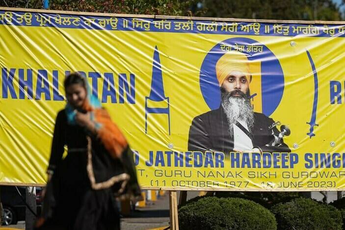 A photograph of late temple president Hardeep Singh Nijjar is seen on a banner outside the Guru Nanak Sikh Gurdwara Sahib, in Surrey, B.C., on Monday, September 18, 2023. Thousands of Sikh voters are expected to turn out today in the Metro Vancouver municipality of Surrey, to vote in an unofficial referendum at the centre of Canada’s ongoing tensions with India. THE CANADIAN PRESS/Darryl Dyck