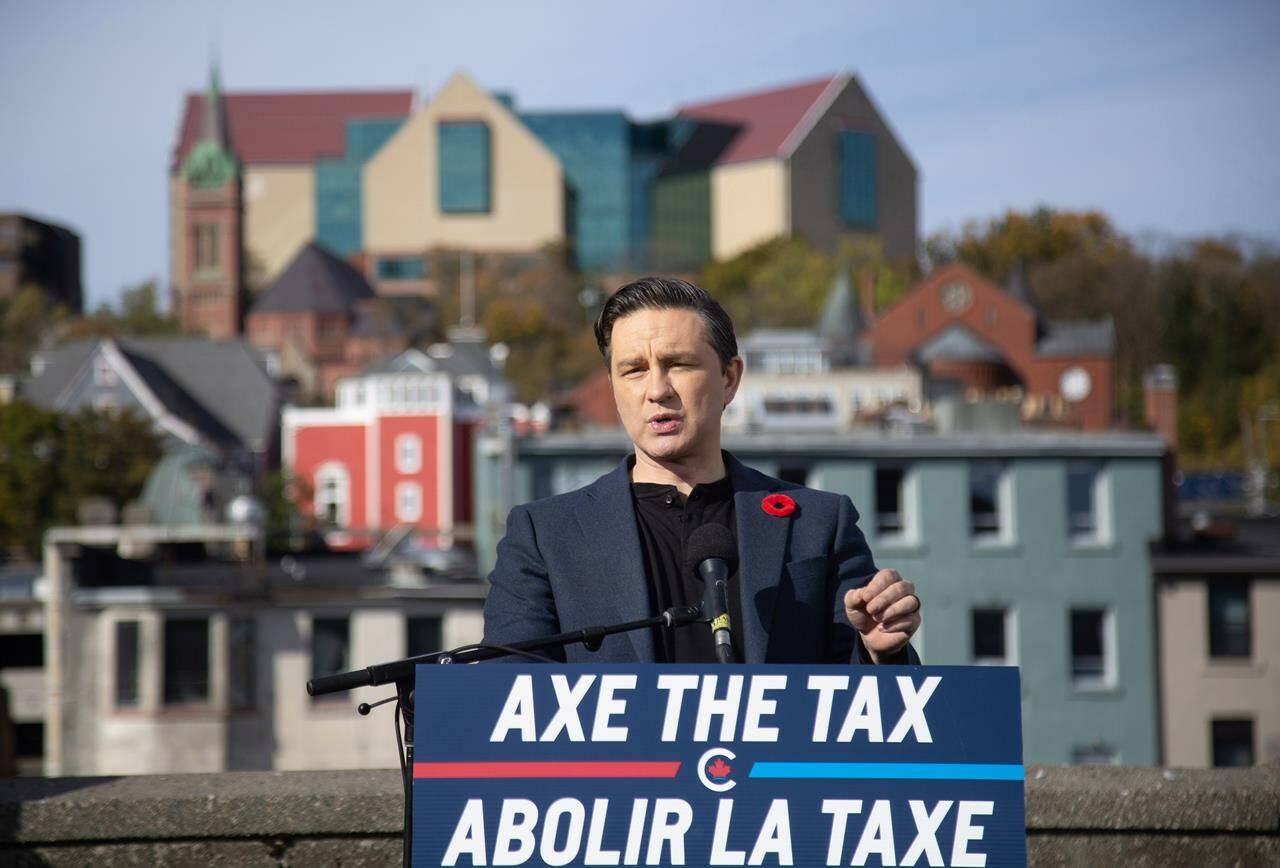 <div>Conservative Leader Pierre Poilievre is calling on the Liberals to exempt all forms of home heating from the carbon price, after Prime Minister Justin Trudeau announced an exemption on home heating oil. Poilievre holds a press conference regarding his “Axe the Tax” message from the roof a parking garage in St. John’s, Friday, Oct.27, 2023. THE CANADIAN PRESS/Paul Daly</div>