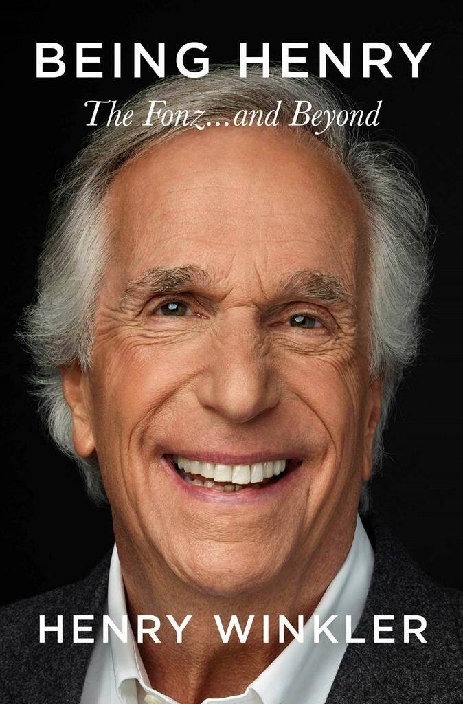This cover image released by Celadon Books shows “Being Henry: The Fonz…and Beyond” by Henry Winkler. (Celadon Books via AP)