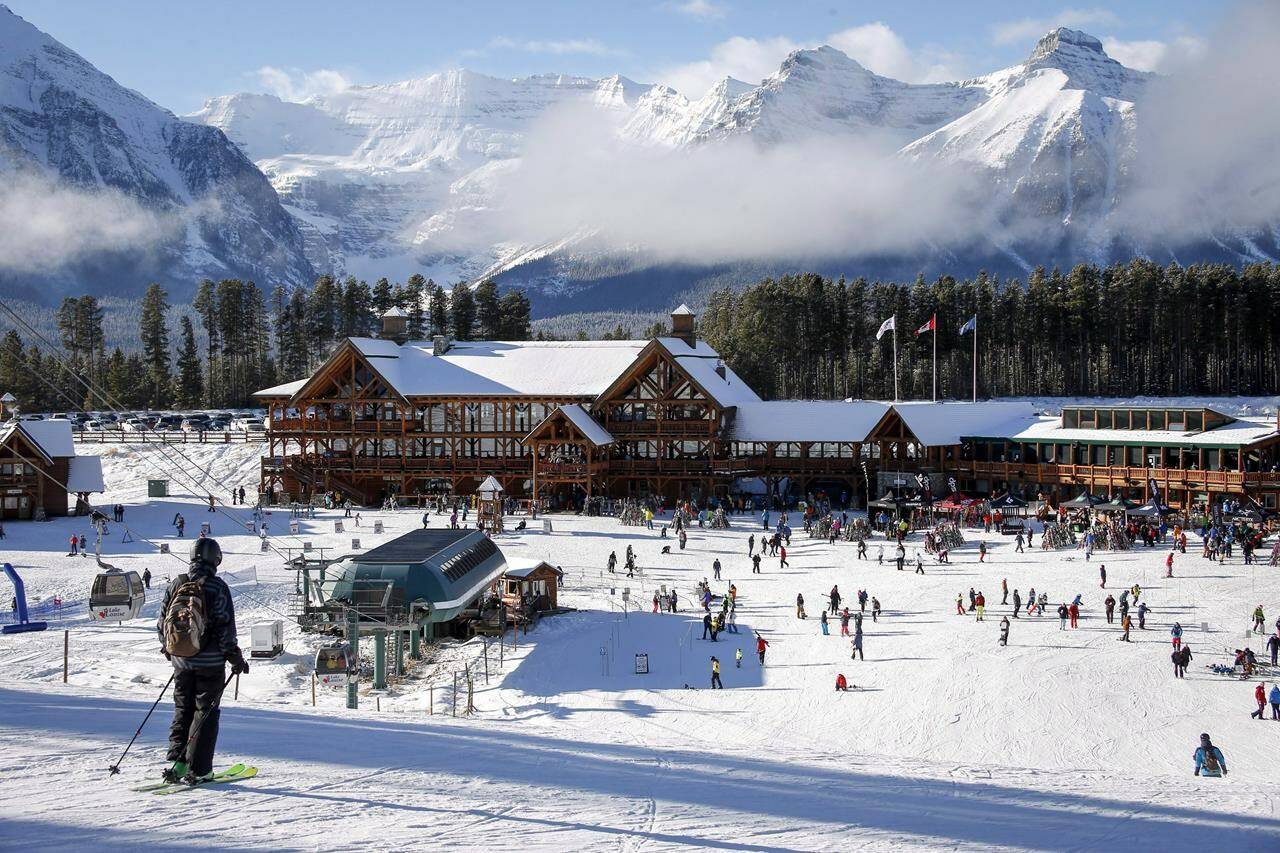 Ski season has started in Alberta as two resorts in the Canadian Rockies, west of Calgary, opened Friday morning. Skiers at the Lake Louise ski resort near Lake Louise, Alta., are shown on Saturday, Nov. 24, 2018. THE CANADIAN PRESS/Jeff McIntosh