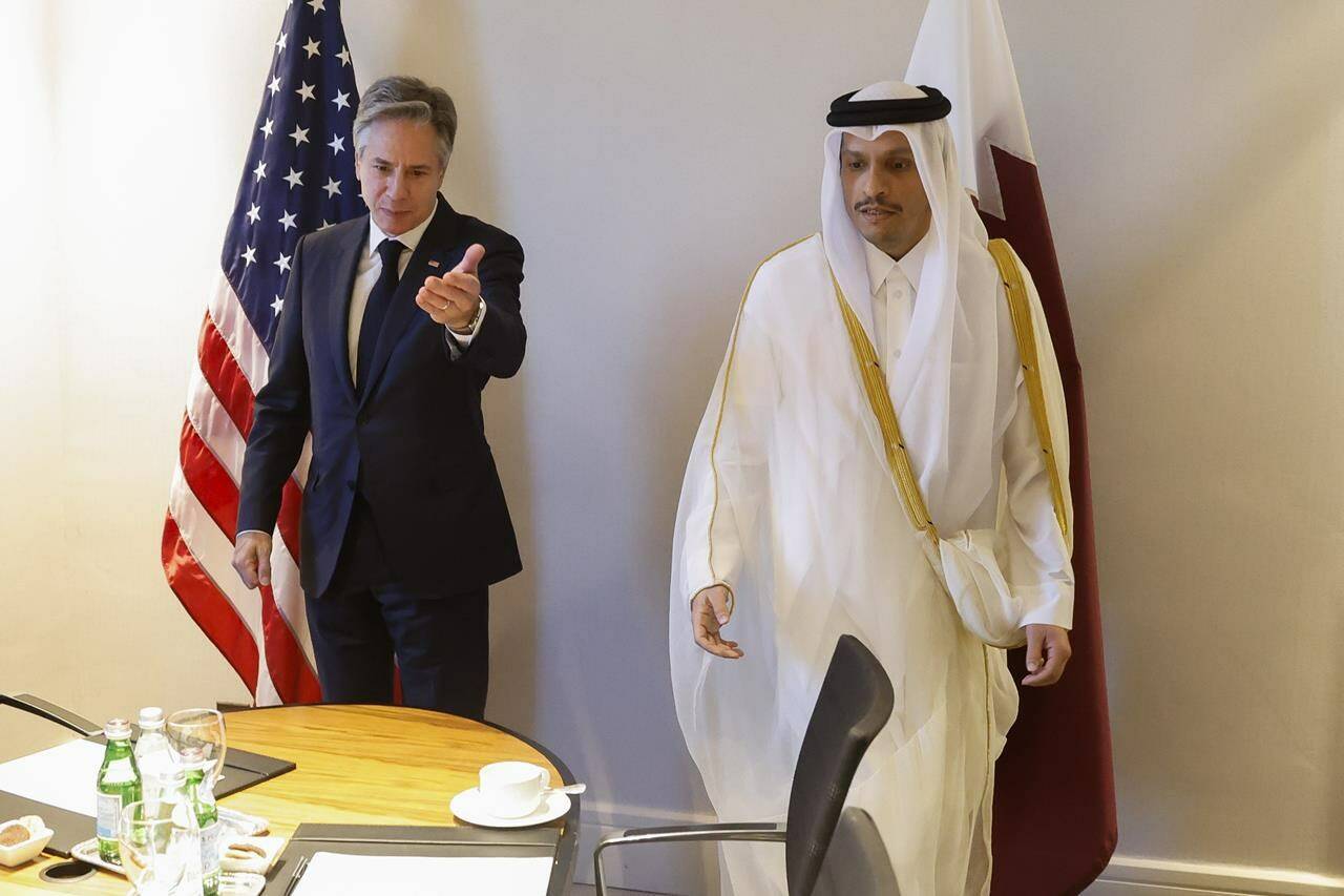 U.S. Secretary of State Antony Blinken, left, meets with Qatari Prime Minister and Minister of Foreign Affairs Sheikh Mohammed bin Abdulrahman bin Jassim Al-Thani at a hotel during a day of meetings, amid the ongoing conflict between Israel and Hamas, in Amman, Jordan, Saturday, Nov. 4, 2023.(Jonathan Ernst/Pool Photo via AP)