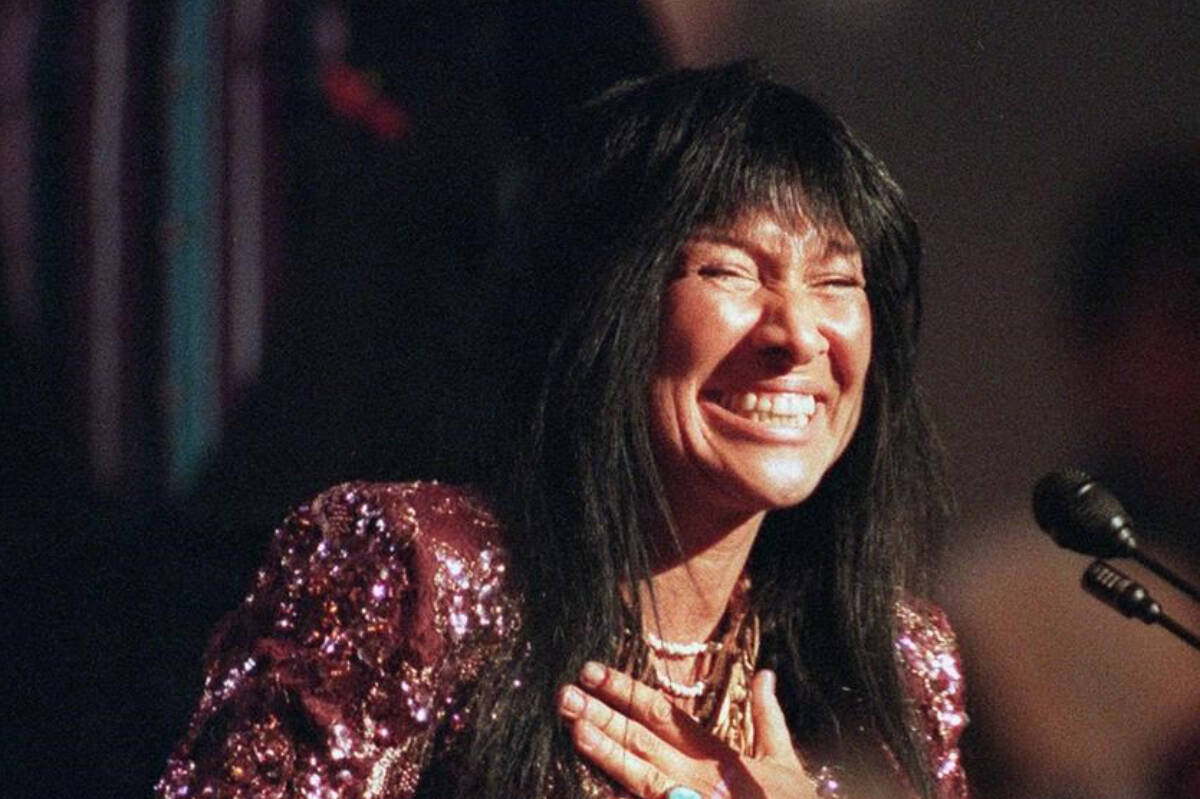 Singer Buffy Sainte-Marie smiles as she accepts the Hall of Fame award at the Juno Awards ceremony in Hamilton on Sunday, March 26, 1995. THE CANADIAN PRESS/Scott Gardner