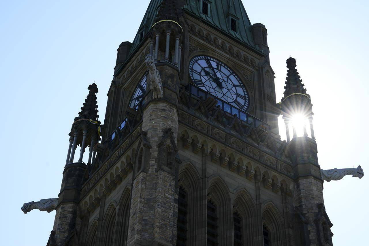 As the deadline to repay pandemic loans and receive partial forgiveness approaches, small businesses are still hoping the federal government will reverse course and extend it for another year. The Peace Tower is pictured from the roof of the Centre Block during a media tour of the Centre Block restoration project on Parliament Hill in Ottawa, Thursday, June 22, 2023. THE CANADIAN PRESS/Sean Kilpatrick