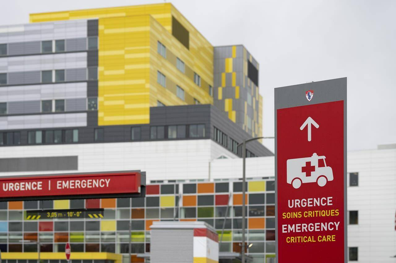 The Canadian Cancer Society says deaths from lung cancer have decreased by about four per cent per year since 2015. An emergency sign is seen by a hospital in Montreal on July 10, 2023. THE CANADIAN PRESS/Christinne Muschi