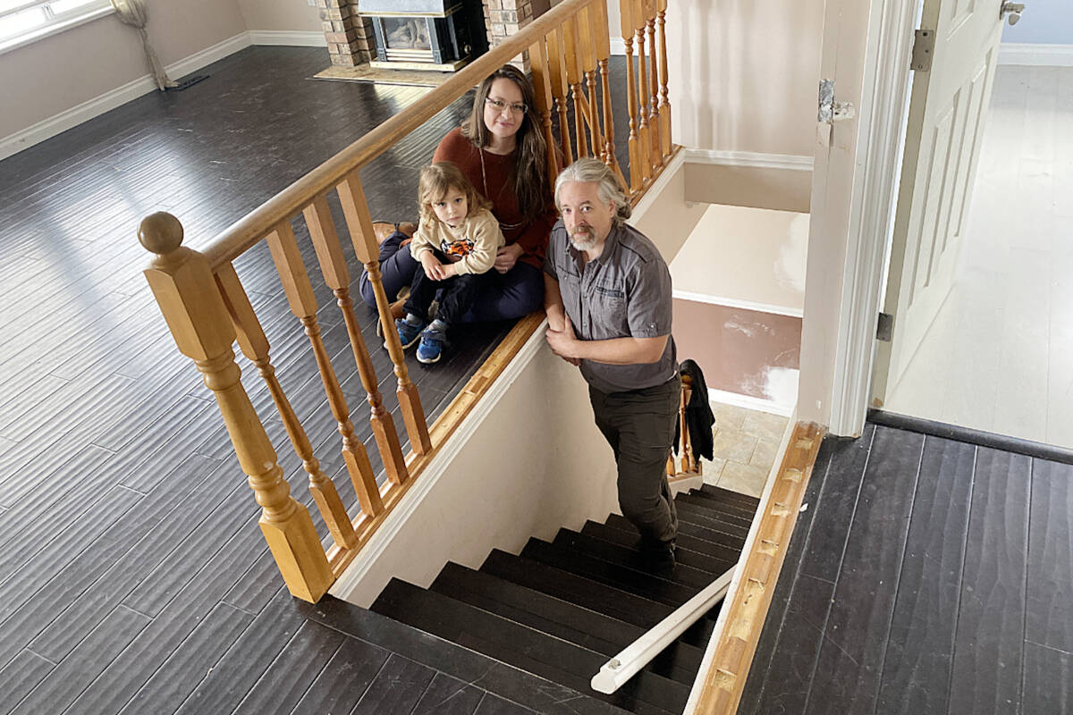 Dominika and Gavin McDonald and their three-year-old Alexander, by some of the damage that, they claim, was caused by their tenants. (Colleen Flanagan/The News)