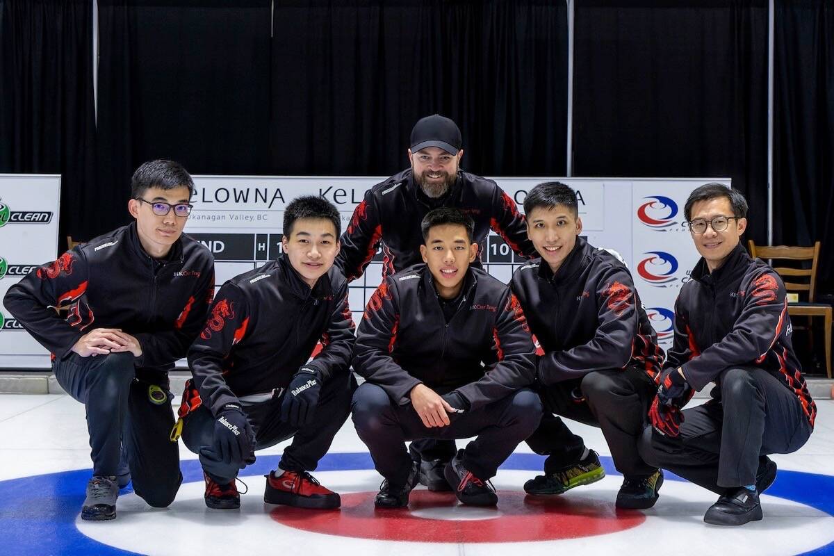 Nelson’s Nathan Small (centre back) poses for a picture with Team Hong Kong at the Pan Continental Curling Championships in Kelowna. Small was asked to serve as the rink’s coach for the event. Photo courtesy Nathan Small