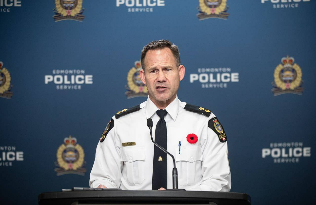 Acting Supt. Colin Derksen, EPS Criminal Investigations Division, speaks about the shooting deaths of a father and 11-year-old son, in Edmonton, Friday, Nov. 10, 2023. THE CANADIAN PRESS/Jason Franson.