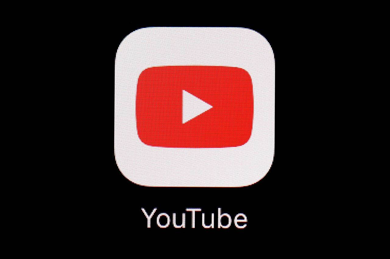 FILE - This March 20, 2018, file photo shows the YouTube app on an iPad in Baltimore. YouTube is rolling out new rules for AI content, Tuesday, Nov. 14, 2023, including requiring creators to reveal whether they’ve used generative artificial intelligence to make realistic looking videos. (AP Photo/Patrick Semansky, File)