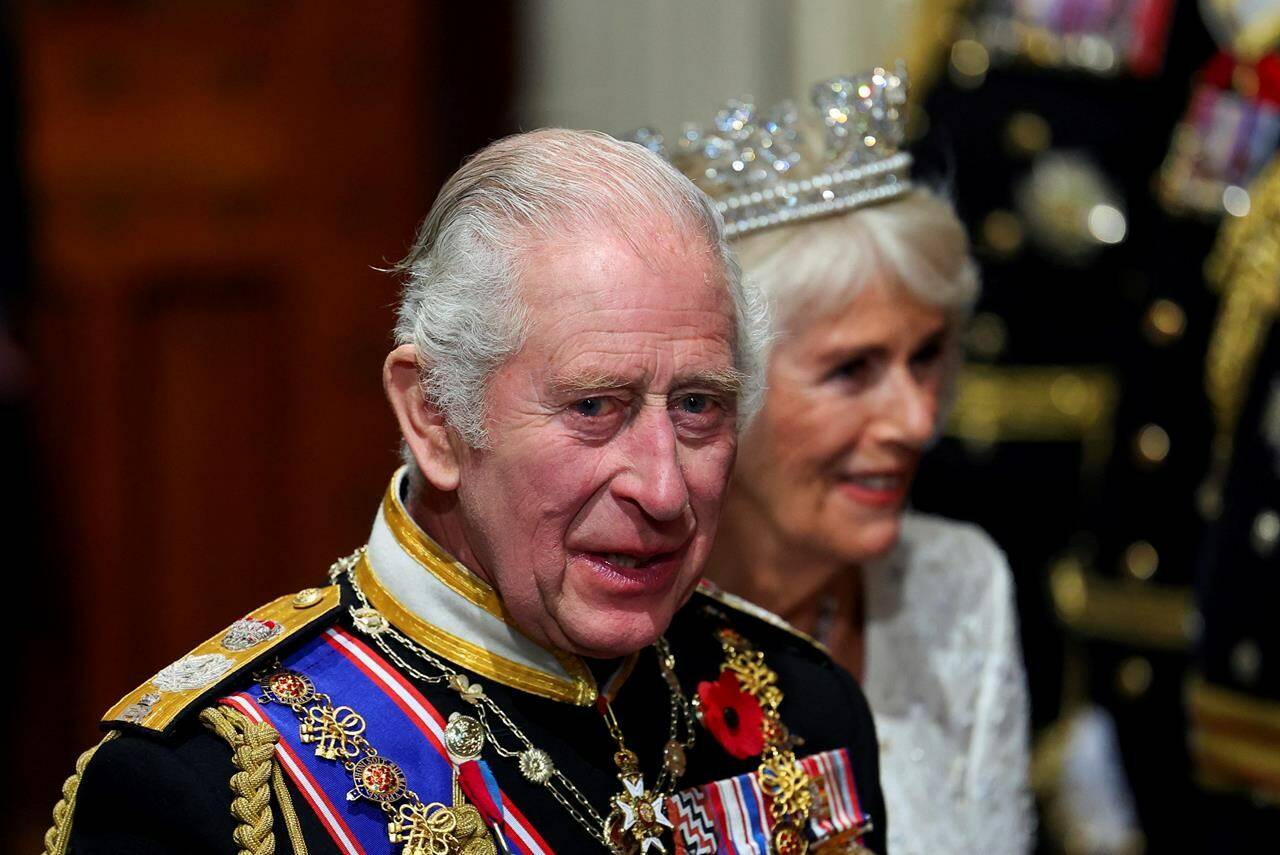 King Charles leaves with Queen Camilla after delivering a speech at the State Opening of Parliament at the Houses of Parliament, in London on Tuesday, Nov. 7, 2023. The Royal Canadian Mint will soon begin producing Canadian coins bearing the face of the King. THE CANADIAN PRESS, AP, Toby Melville/Pool Photo