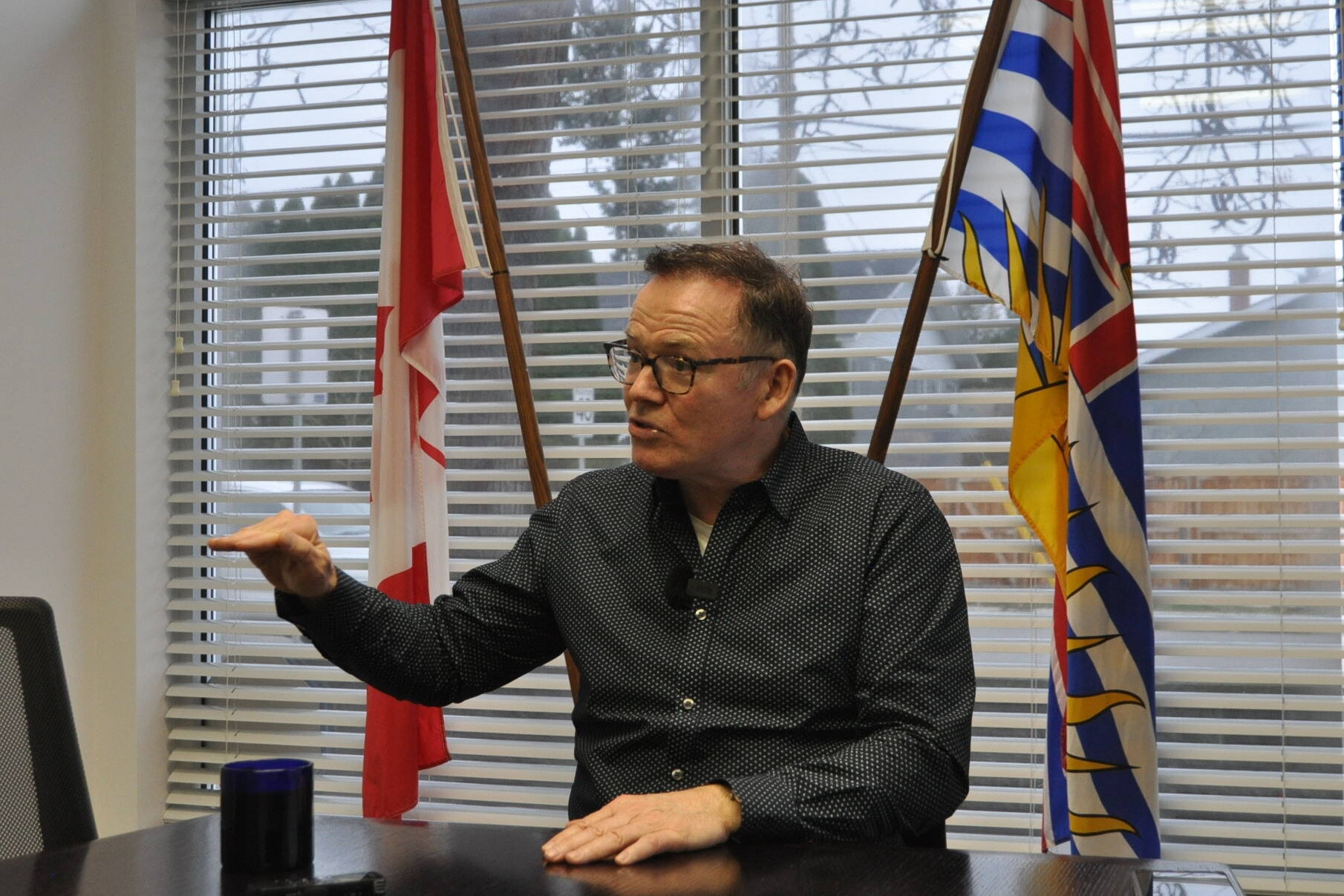 BC United Leader Kevin Falcon speaks to the media during a stop in Kelowna on Nov. 15, 2023. (Photo / Maya Courtney)