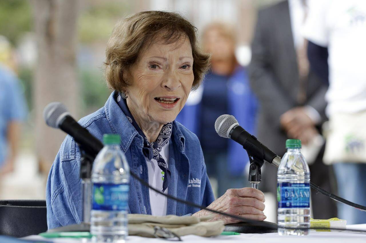 FILE - Former first lady Rosalynn Carter answers questions during a news conference at a Habitat for Humanity building site, Nov. 2, 2015, in Memphis, Tenn. Carter, the closest adviser to Jimmy Carter during his one term as U.S. president and their four decades thereafter as global humanitarians, has died at the age of 96. (AP Photo/Mark Humphrey, File)