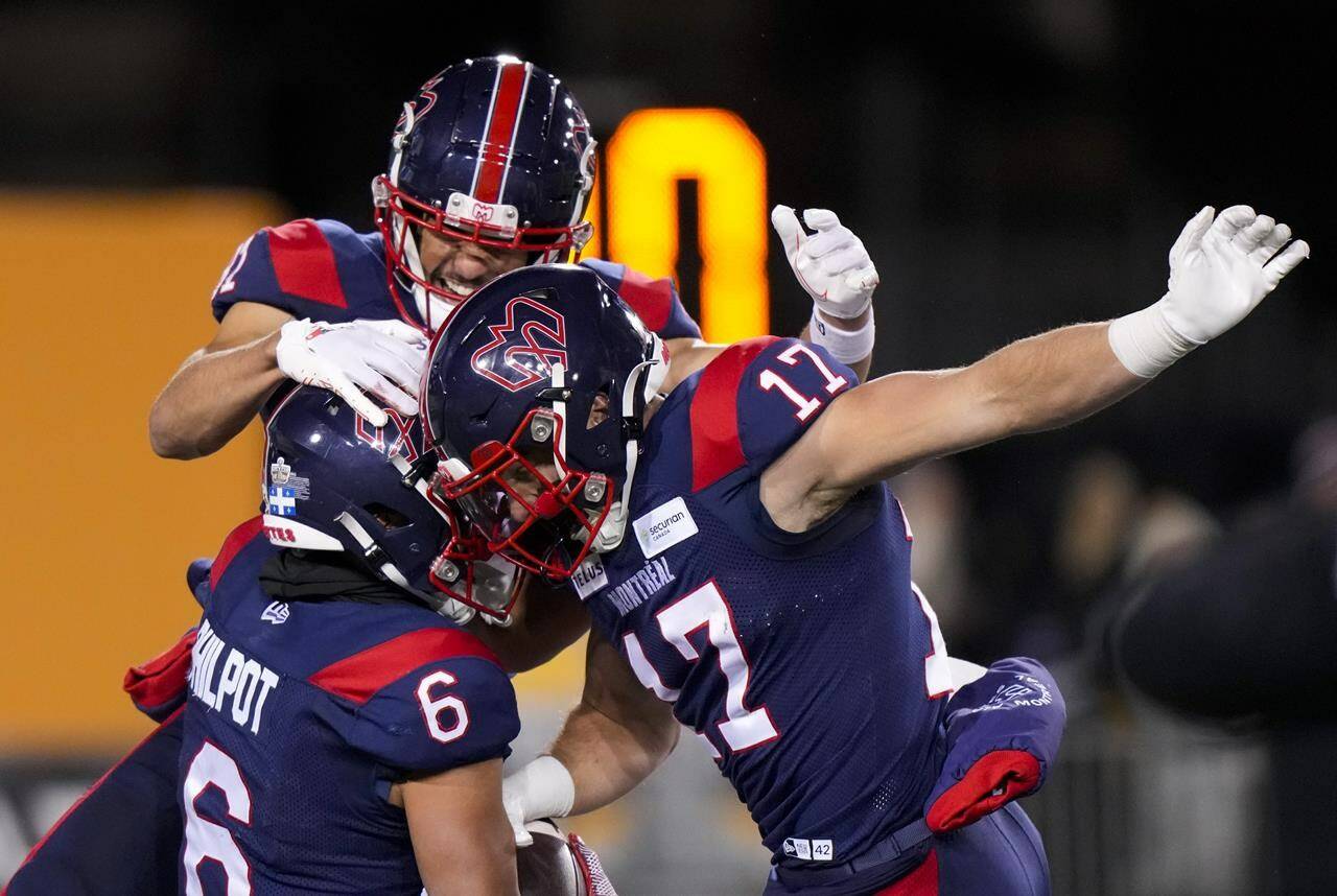 Montreal Alouettes wide receiver Tyson Philpot (6) celebrates with teammates wide receiver Cole Spieker (17) and wide receiver Austin Mack (81) after scoring a touchdown against the Winnipeg Blue Bombers during the second half of football action at the 110th CFL Grey Cup in Hamilton, Ont., on Sunday, November 19, 2023. THE CANADIAN PRESS/Frank Gunn