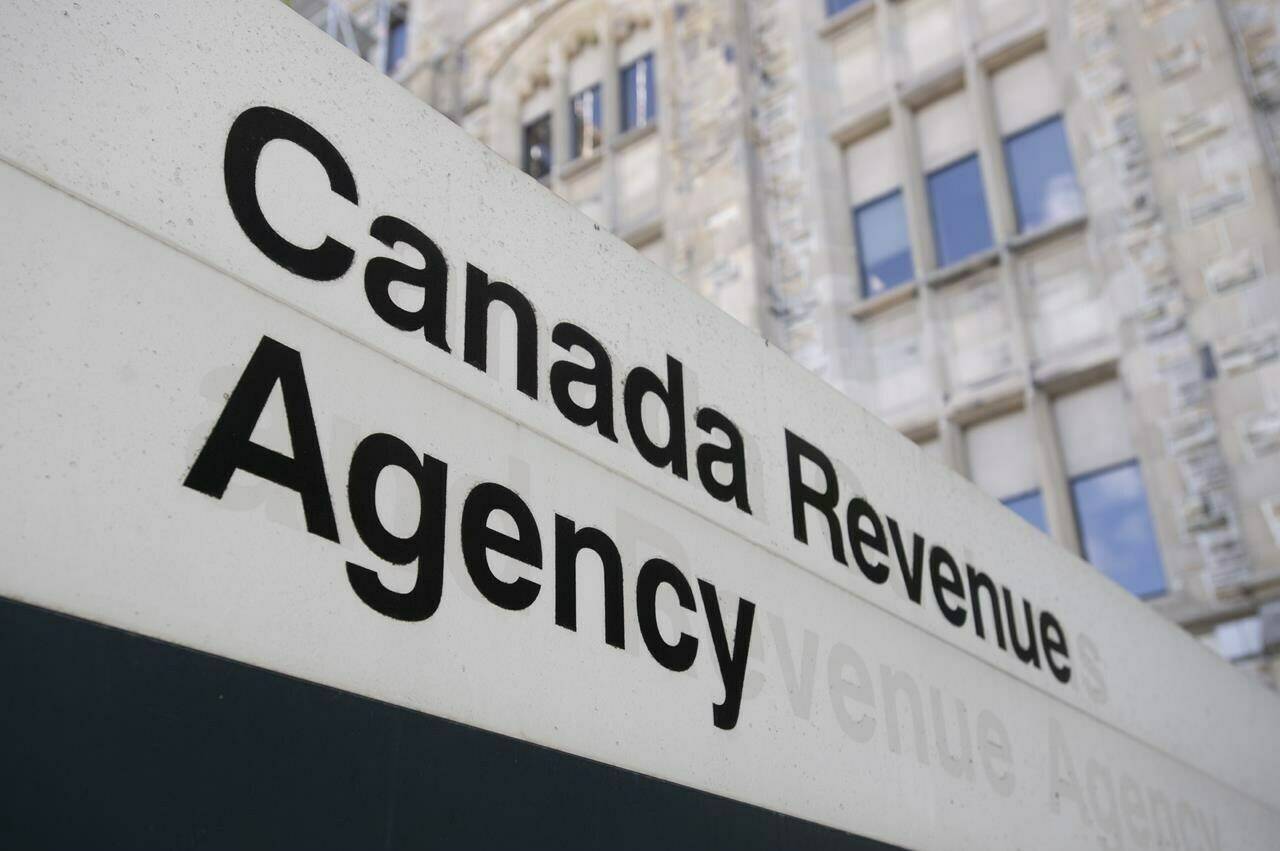 The Canada Revenue Agency has denied or adjusted $458 million in funds disbursed to employers through a pandemic-era wage subsidy program as a result of a partially completed auditing process. A sign outside the Canada Revenue Agency is seen in Ottawa, Monday, May 10, 2021. THE CANADIAN PRESS/Adrian Wyld