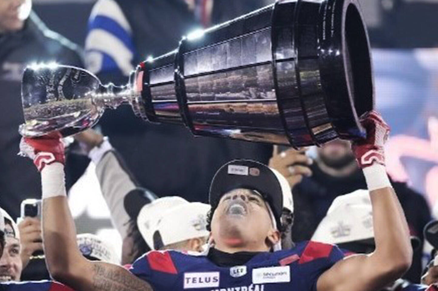 Seaquam Secondary product Tyson Philpot hoists the Grey Cup after the Montreal Alouettes defeated the Winnipeg Blue Bombers 28-24 in Hamilton on Sunday. courtesy CFL.ca