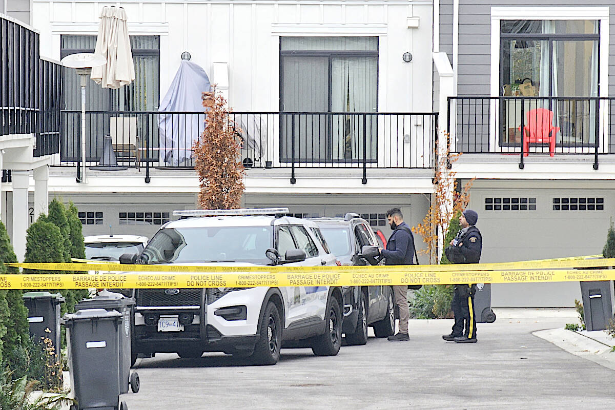 Investigators at the scene of a shooting in Langley on Tuesday, Nov. 21. (Dan Ferguson/Langley Advance Times)