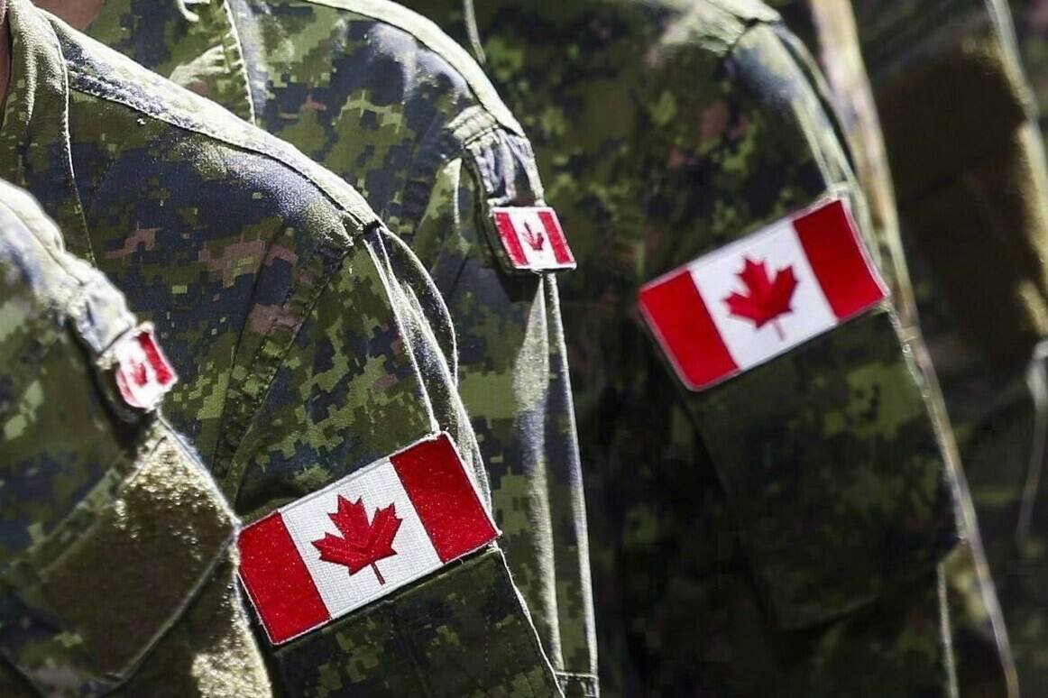 Members of the Canadian Armed Forces march in Calgary on Friday, July 8, 2016. It might look frightening, but Vancouver residents are being advised not to be concerned if they hear what sounds like gunfire or see armed military members around a now-closed brewery on the city’s west side.THE CANADIAN PRESS/Jeff McIntosh