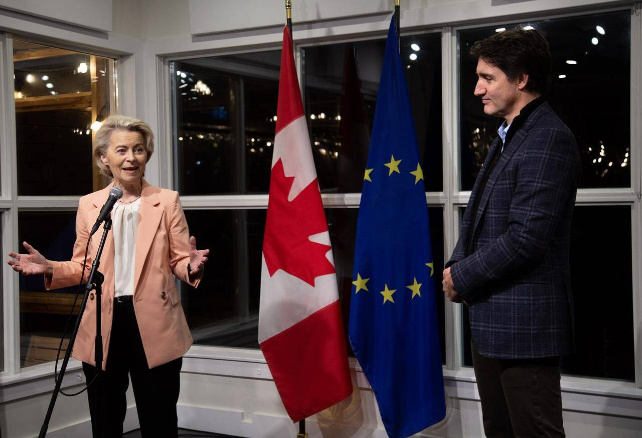 The President of the European Commission, Ursula von der Leyen speaks as Prime Minister Justin Trudeau looks on during a reception at the Quidi Vidi Brewery in St. John’s on Thursday, November 23, 2023. THE CANADIAN PRESS/Paul Daly
