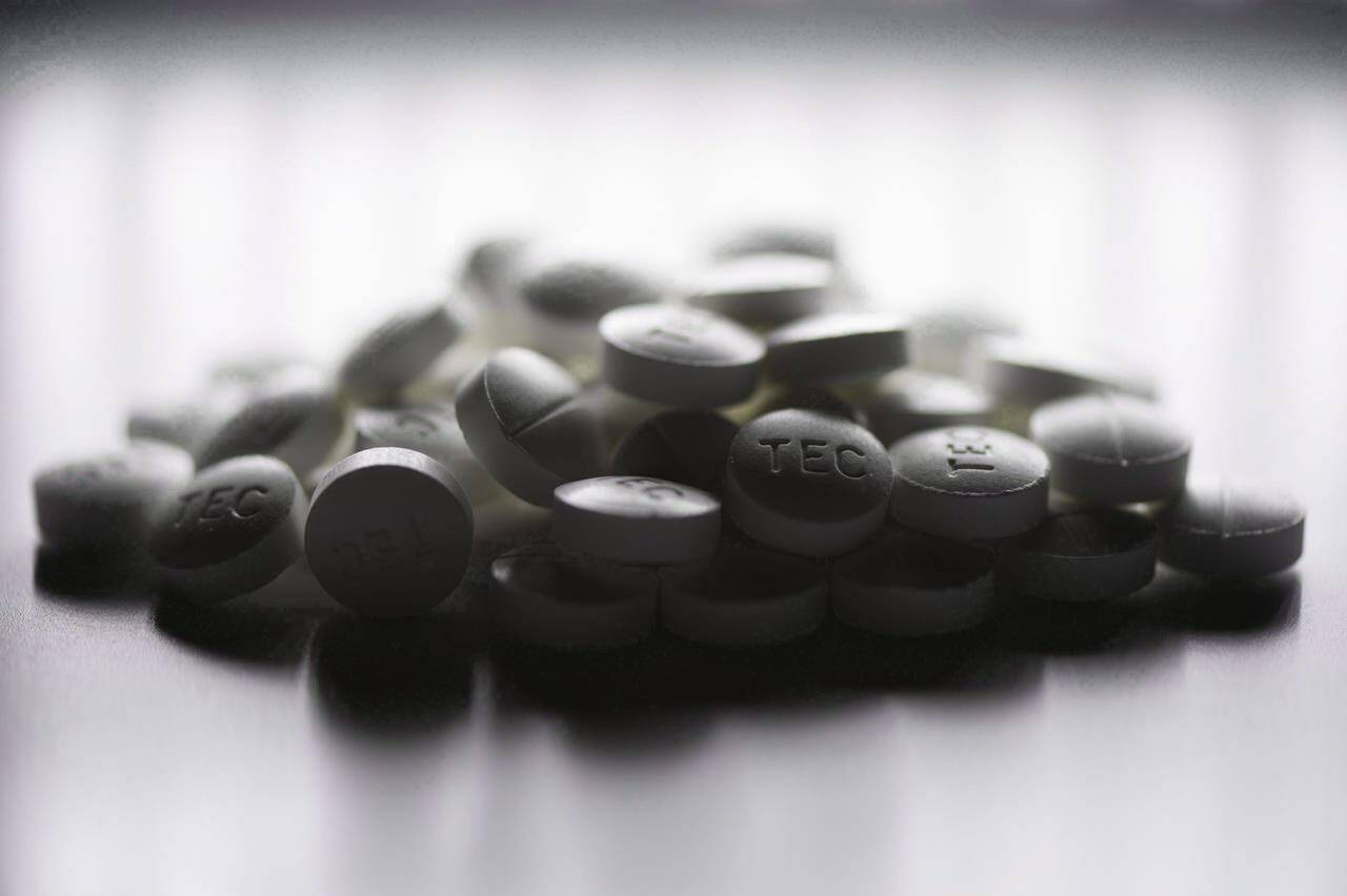 Prescription pills containing oxycodone and acetaminophen are shown in this June 20, 2012 photo. The British Columbia government goes up against dozens of health care and pharmaceutical companies in court today in a bid get certification for a class-action lawsuit over the costs of the opioid crisis. THE CANADIAN PRESS/Graeme Roy