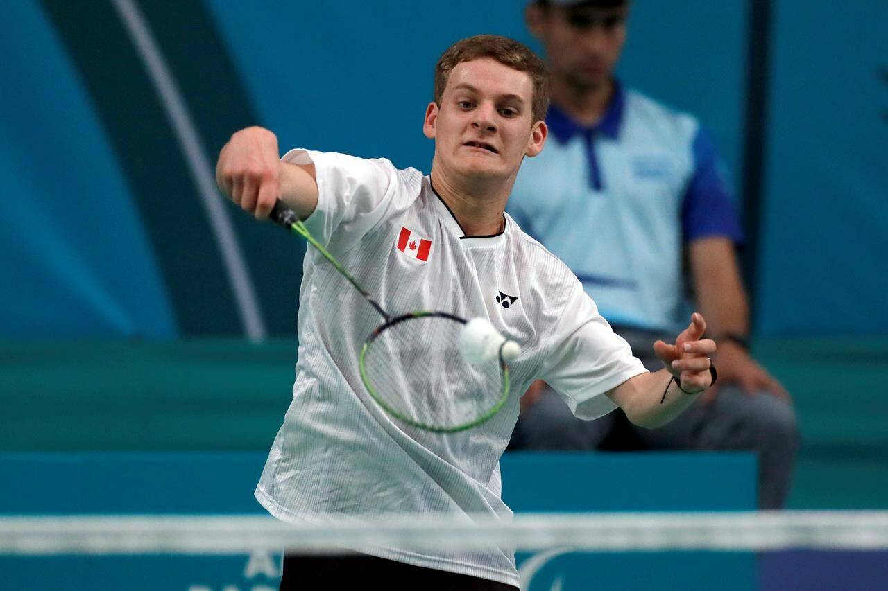 William Roussy of Canada returns to Pedro De Vinatea of Peru in the SL3 men’s singles badminton event at Parapan American Games in Santiago, Chile on Sunday, Nov.23, 2023. Roussy of Marie, Que., earned a silver medal in the event on the final day of the Parapan American Games. THE CANADIAN PRESS/HO-Parapan American Games-Felipe Poga