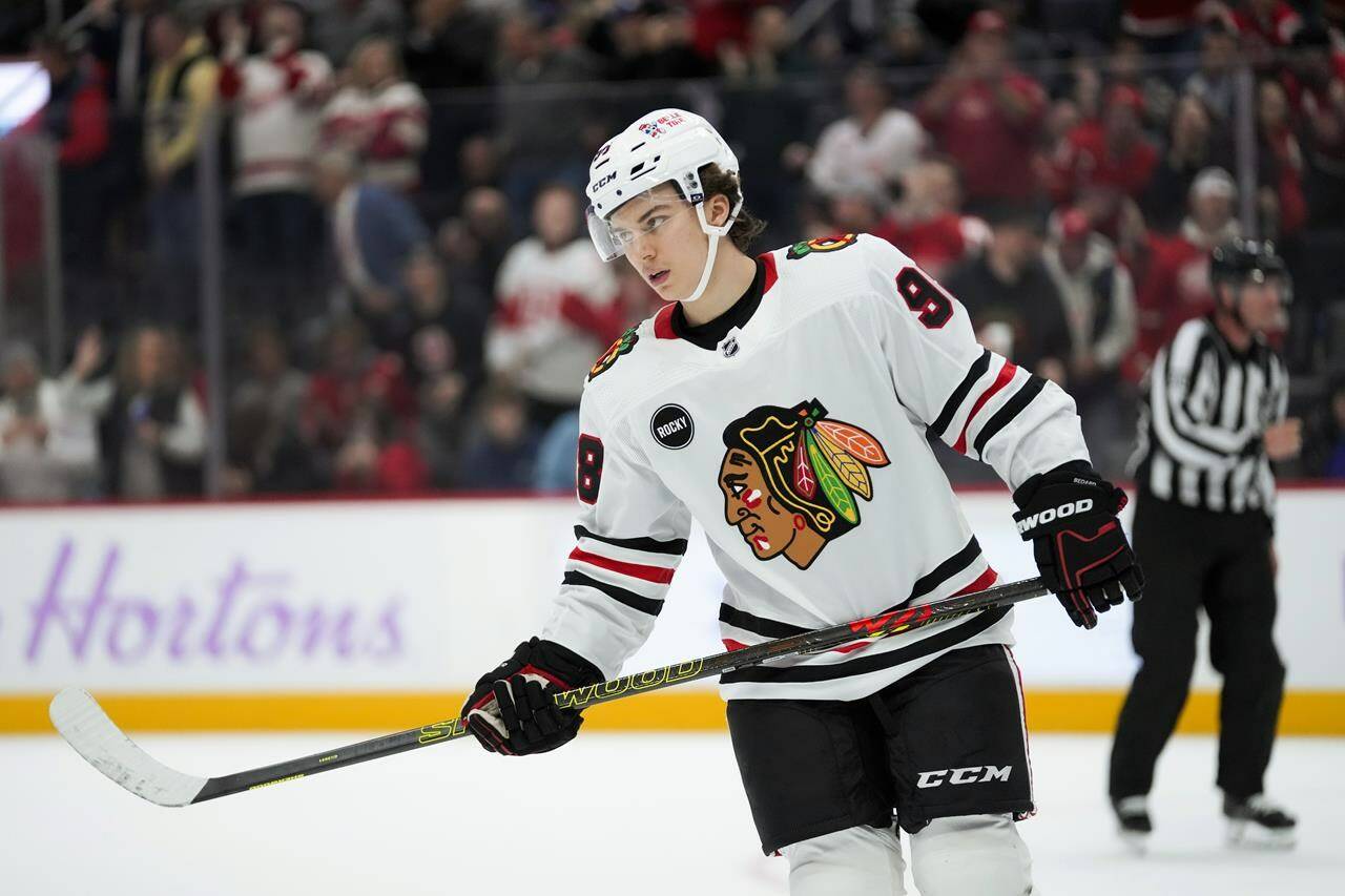 Chicago Blackhawks center Connor Bedard (98) plays against the Detroit Red Wings in the third period of an NHL hockey game Thursday, Nov. 30, 2023, in Detroit. Bedard has been named the NHL’s rookie of the month for November.THE CANADIAN PRESS/AP-Paul Sancya