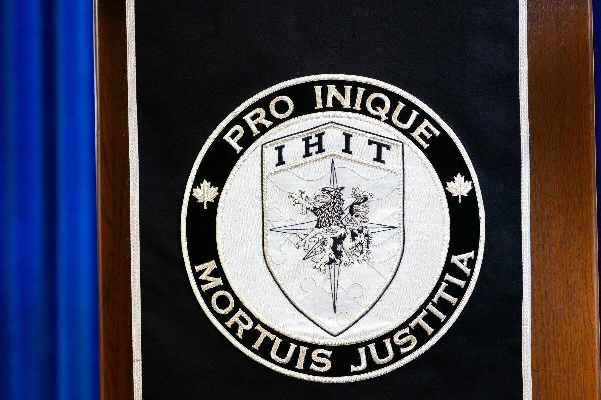 The Integrated Homicide Investigation Team’s logo on the podium, pictured Aug. 16, 2023. IHIT is investigating after two people were found dead inside a Richmond home Nov. 30, 2023. (Anna Burns)