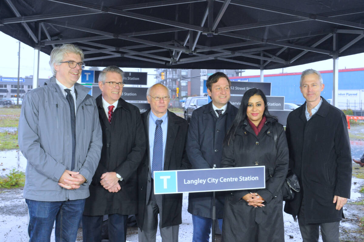Gathered at the site of the SkyTrain terminus in Langley City were Langley MLA Andrew Mercier, Cloverdale-Langley City MP John Aldag, Fleetwood Port Kells MP Ken Hardie, B.C. Transportation Minister Rob Fleming, Surrey BIA chair Shirley Samujh-Dayal, and TransLink CEO Kevin Quinn. (Heather Colpitts/Black Press Media)