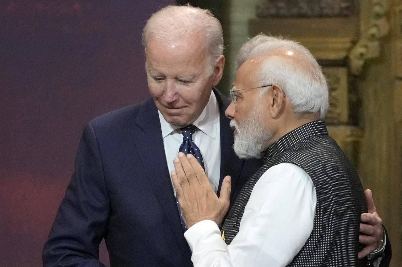 FILE - U.S. President Joe Biden, left, and India Prime Minister Narendra Modi talk during the G20 leaders summit in Nusa Dua, Bali, Indonesia, Nov. 15, 2022. The warm ties India and the United States have built are being tested after US prosecutors on Wednesday, Nov. 29, 2023, accused an Indian official of orchestrating an alleged assassination plot in New York City. (AP Photo/Dita Alangkara, Pool, File)