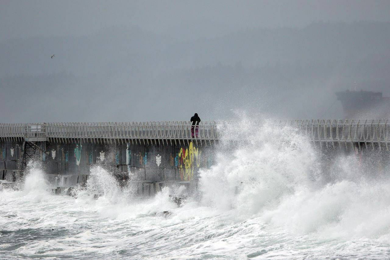 Environment Canada says a heavy rain storm it’s calling an atmospheric river is forecast to hit southern British Columbia Monday. Waves pound Ogden Point breakwater during the first major storm of the year in Victoria, Tuesday, Jan. 5, 2021. THE CANADIAN PRESS/Chad Hipolito