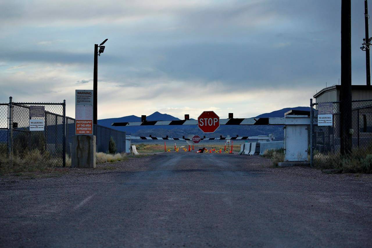 <div>According to a new poll, 79 per cent of Canadians and 84 per cent of Americans reported believing in at least one conspiracy theory. Signs warn about trespassing at an entrance to the Nevada Test and Training Range near Area 51 outside of Rachel, Nev., July 22, 2019. THE CANADIAN PRESS/AP-John Locher</div>